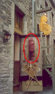 Mask (blurred) on shop door